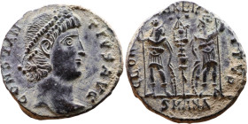 Constantius II (337-361) Follis. Obverse: Draped, cuirassed bust right. Reverse: GLORIA EXERCITVS, two Soldiers standing front, heads turned inward at...