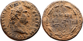 Trajan (98-117) Antioch Bronze coin. Obv: Laureate, draped bust of emperor. Rev:Inscription in two lines within laurel-wreath

Artificial sand patin...