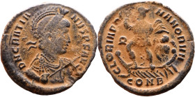 Gratianus (375-383 AD) Follis. Obv.: D N GRATIANVS P F AVG. Diademed, helmeted, draped, and cuirassed bust right, holding spear and shield. Rev.: GLOR...