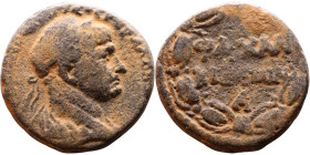 Trajan (98-117) Cyrrhus, Syria Bronze coin. Obv: Laureate, draped bust of emperor. Rev: KYΡΡHC TΩN, B below, in three lines

Artificial sand patina...