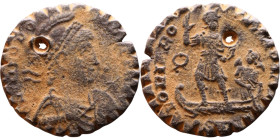 Theodosius I (379-395) Follis. Obv: DN THEODOSIVS PF AVG, Diademed, helmeted, draped, and cuirassed bust right, holding spear and shield. Rev.: GLORIA...