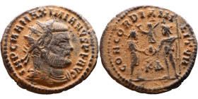 Maximianus. (286-305 ). Æ Antoninian. Obv: Radiate cuirassed bust of Maximianus right. Rev: CONCORDIA MILITVM. Jupiter standing left presents Victory ...