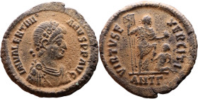 Valentinian II (375-392) Follis.Obverse: D N VALENTINIANVS P F AVG Pearl-diademed, draped, cuirassed bust right Reverse: VIRTVS EXERCITI, emperor stan...