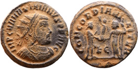 Maximianus. (286-305 ). Æ Antoninian. Obv: Radiate cuirassed bust of Maximianus right. Rev: CONCORDIA MILITVM. Jupiter standing left presents Victory ...