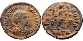 Valentinian II (375-392) Follis.Obverse: Pearl-diademed, draped, cuirassed bust right Rev: Roma seated left on cuirass, holding Victory on globe thron...
