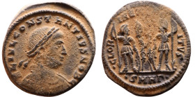 Constantius II (Caesar: 324-337) Follis. Obverse: Laureate, draped, cuirassed bust right. Reverse: GLORIA EXERCITVS, two Soldiers standing front, head...