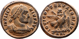 Licinius I (308-324 AD) follis. Obv: Cuirassed bust of Licinius Rev: eagle standing left on waved line, its left wing lowered, carrying emperor, stand...
