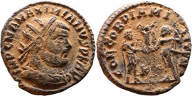 Maximianus. (286-305 ). Æ Antoninian. Obv: Radiate cuirassed bust of Maximianus right. Rev: CONCORDIA MILITVM. Jupiter standing left presents Victory ...