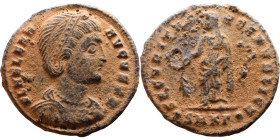 Helena (Mother of Constantine I) Mint: Antioch. Follis. Obverse: Diademed and draped bust right, hair elaborately dressed Reverse: Helena standing lef...