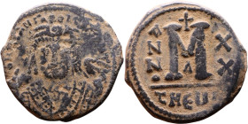Maurice Tiberius (582-602) Follis Obverse: Crowned bust facing, wearing consular robes, holding mappa and eagle-tipped scepter , Reverse: Large M cros...