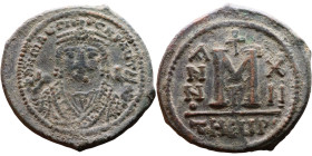 Maurice Tiberius (582-602) Follis Obverse: Crowned bust facing, wearing consular robes, holding mappa and eagle-tipped scepter , Reverse: Large M cros...
