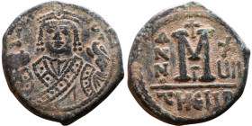 Maurice Tiberius (582-602) Follis Obverse: Crowned bust facing, wearing consular robes, holding mappa and eagle-tipped scepter , Reverse: Large M cros...