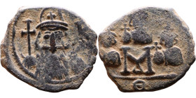 Constans II (641-668) Family Follis.. Obverse: No inscription Constans bust. Reverse: M between Heraclius, Constantine IV, Tiberius

22mm 4.34g