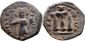 Constans II (641-668) Follis. Obverse: Imperial figure holding cross and globus Reverse: m and inscription

22mm 3.14g