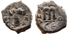 Constans II (641-668) Follis. Obverse: Imperial figure holding cross and globus Reverse: m and inscription

20mm 6.09g