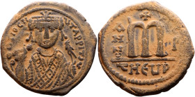Tiberius II Constantine (578-582). Follis. Obverse: mperor, crowned and mantled bust facing, holding mappa and eagle-tipped sceptre, cross above eagle...