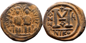 Justin II and Sophia (565-578) Follis Obverse: DN IVSTINVS PP AVG Justin and Sophia on thrones Reverse: Large M between ANNO and regnal year, above cr...