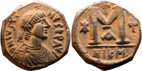 Justin I (518-527) Follis Obverse: DN IVSTINVS PP AVG, diademed, draped, and cuirassed bust right Reverse: Large M, Mintmark

Artificial sand patina...