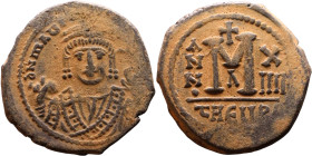 Maurice Tiberius (582-602) Follis Obverse: Crowned bust facing, wearing consular robes, holding mappa and eagle-tipped scepter , Reverse: Large M cros...