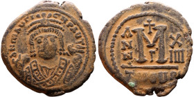 Maurice Tiberius (582-602) Follis Obverse: Crowned bust facing, wearing consular robes, holding mappa and eagle-tipped scepter , Reverse: Large M cros...