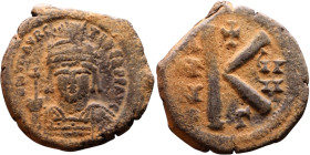 Maurice Tiberius (582-602) Half Follis. Obverse: Helmeted and cuirassed bust facing, holding globus cruciger and shield., Reverse: Large K above cross...