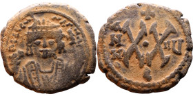 Maurice Tiberius (582-602) Half Follis Obverse: Crowned bust facing, wearing consular robes, holding mappa and eagle-tipped scepter , Reverse: Large X...