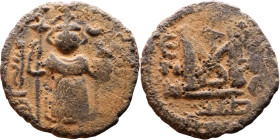 al-Malik ibn Marwan (687-705), Byzantine style folis Obverse: Imperial figure holding globe and cross Reverse: M and inscription

Artificial sand pa...