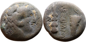 Alexander III the Great (Macedonian King 336-323 BC) bronze coin. Obv: Head of Herakles right, wearing lion's skin headdress Rev: Club, quiver and bow...