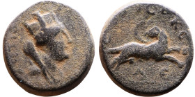 Roman Antioch (I century AD) Bronze coin. Obv: Bust of Tyche. Rev: Ram leaping right

15mm 3.71g