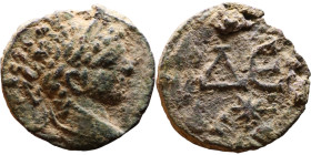Elagabalus (218-222) Syria: Antioch Obv: Bust of emperor. Rev: Large A E

17mm 3.00g