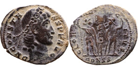 Constans (337 - 350) Follis. Obverse: Draped, cuirassed bust right. Reverse: GLORIA EXERCITVS, two Soldiers standing front, heads turned inward at two...