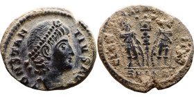 Constantius II (337-361) Follis. Obverse: Draped, cuirassed bust right. Reverse: GLORIA EXERCITVS, two Soldiers standing front, heads turned inward at...