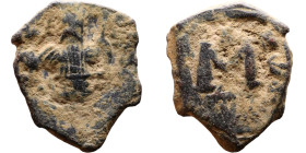 Constans II (641-668) Follis. Obverse: Imperial figure holding cross and globus Reverse: m and inscription

17mm 3.54g
