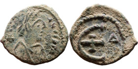 Justinian I (527-565) Pentanummium. Obverse: DN IVSTINIANVS PP AVG, diademed, draped, and cuirassed bust right Reverse: Large E

16mm 1.79g