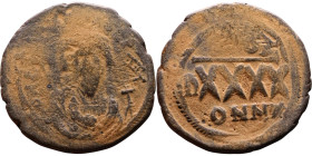 Phocas (602-610) Follis. Obverse: DN FOCA PERP AVG Crowned bust facing, wearing consular robes, holding mappa and eagle-tipped scepter , Reverse: Larg...