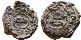 Umayyad/Abbasid. Bronze coin. Obverse: Arabic inscription. Reverse: Arabic inscription

20mm 6.58g