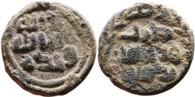 Umayyad/Abbasid. Bronze coin. Obverse: Arabic inscription. Reverse: Arabic inscription

14mm 2.26g