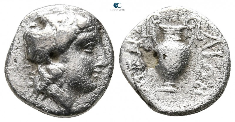 Macedon. Mende 405-348 BC. 
Tetrobol AR

13 mm., 1,98 g.

Head of Dionysos ...