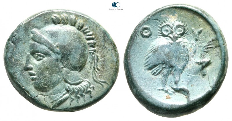 Akarnania. Thyrrheion 300-250 BC. 
Bronze Æ

17 mm., 3,17 g.

Head of Athen...