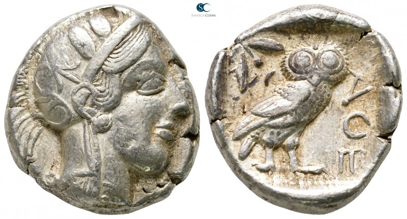 Attica. Athens circa 454-404 BC. 
Tetradrachm AR

25 mm., 17,20 g.

Head of...