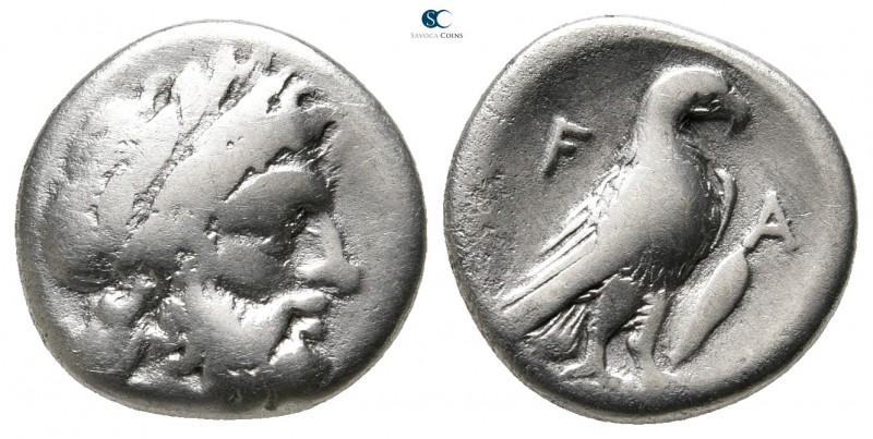 Elis. Olympia 352-348 BC. 
Hemidrachm AR

14 mm., 2,59 g.

Laureate head of...