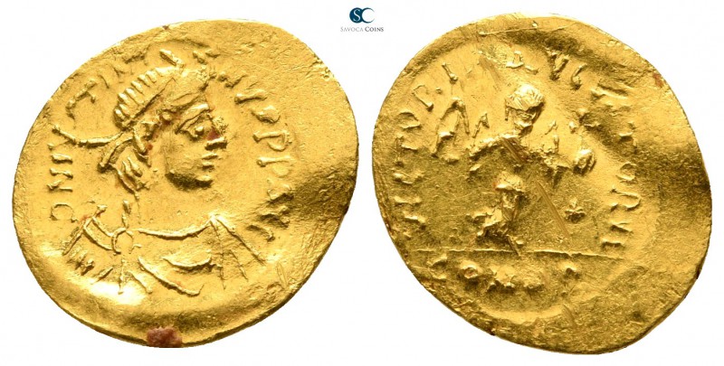 Justinian I AD 527-565. Constantinople
Tremissis AV

16 mm., 1,49 g.

DN IV...