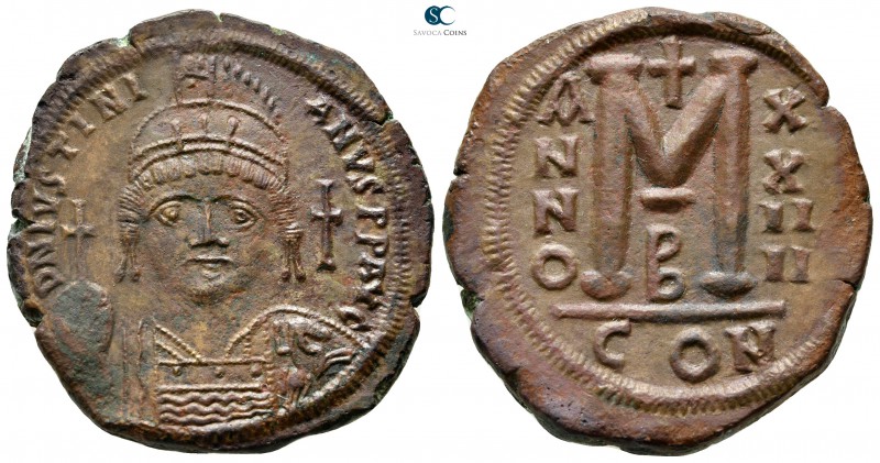 Justinian I AD 527-565. Constantinople
Follis Æ

34 mm., 17,91 g.

D N IVST...