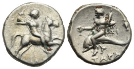 Calabria, Tarentum. Circa 272-240 BC. Nomos (Silver, 21.07 mm, 6.43 g). Warrior on horseback galloping r., hurling javelin. Rv. Taras riding dolphin l...