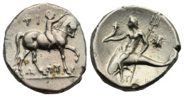 Calabria, Tarentum. Circa 272-235 BC. Nomos (Silver, 21.05 mm, 6.42 g). Youth nude on horseback r., crowning horse. Rv. Taras riding dolphin l., holdi...