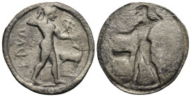 Bruttium, Kaulonia. Circa 525-500 BC. Stater (Silver, 30.31 mm, 5.94 g). Apollo nude advancing r., holding laurel branch and small daimon running r. w...