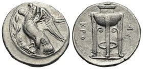 Bruttium, Kroton. Didrachm, circa 350-300 BC. (Silver, 24.30 mm, 7.84 g.). Eagle standing l. on olive branch with open wings and raised head. Rv. Trip...