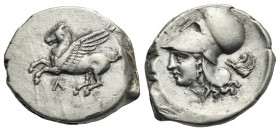 Akarnania, Leukas. Circa 320-280 BC. Stater (Silver, 23.95 mm, 8.51 g). Pegasus flying l. Rv. Helmeted head of Athena l., forepart of griffin flying l...