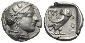 Attica, Athens. Tetradrachm, “transitional” issue, circa 460-454 BC. (Silver, 24.72 mm, 17.13 g.). Helmeted head of Athena r., decorated with palmette...