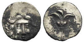 Caria, Mylasa. Drachm, pseudo-Rhodian type, circa 140-130, (Silver, 21.30 mm, 1.90 g). Head of Helios facing, eagle standing r. with closed wings on h...